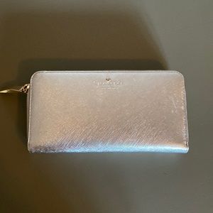 Kate Spade metallic silver wallet with gold zip
